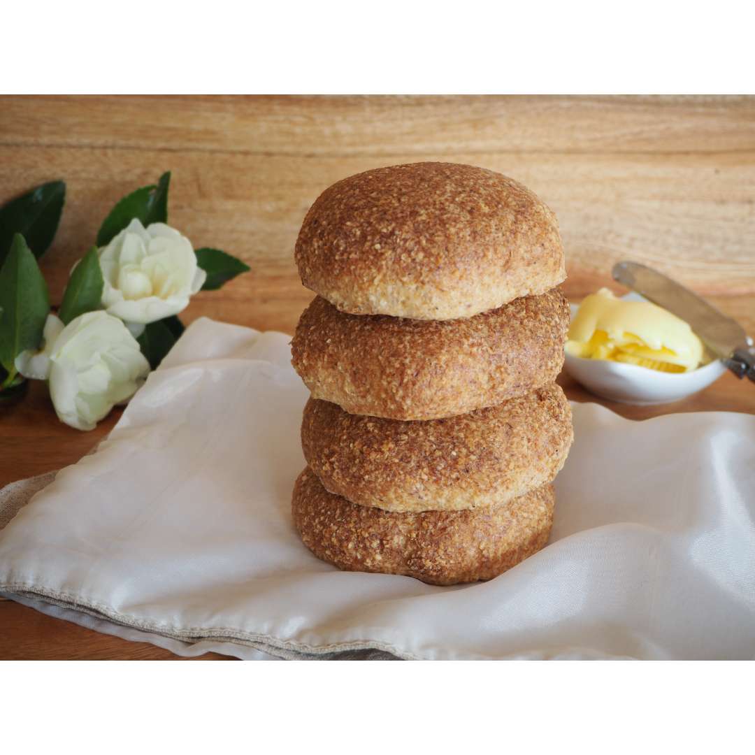 Low carb keto bread rolls stacked with butter