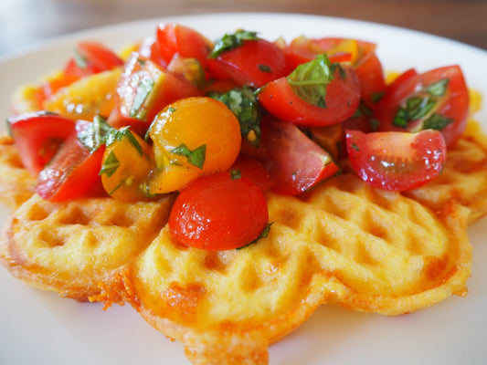 Low Carb Keto Chaffle (cheese waffle) topped with mixed tomato